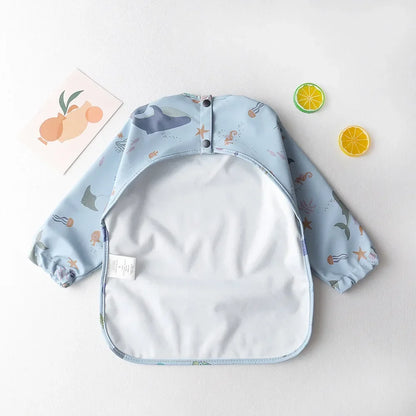 Pure Joy Messy Moments™ – Waterproof Baby Bib with Sleeves