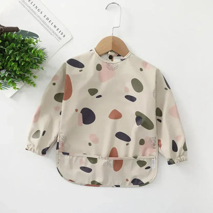 Pure Joy Messy Moments™ – Waterproof Baby Bib with Sleeves