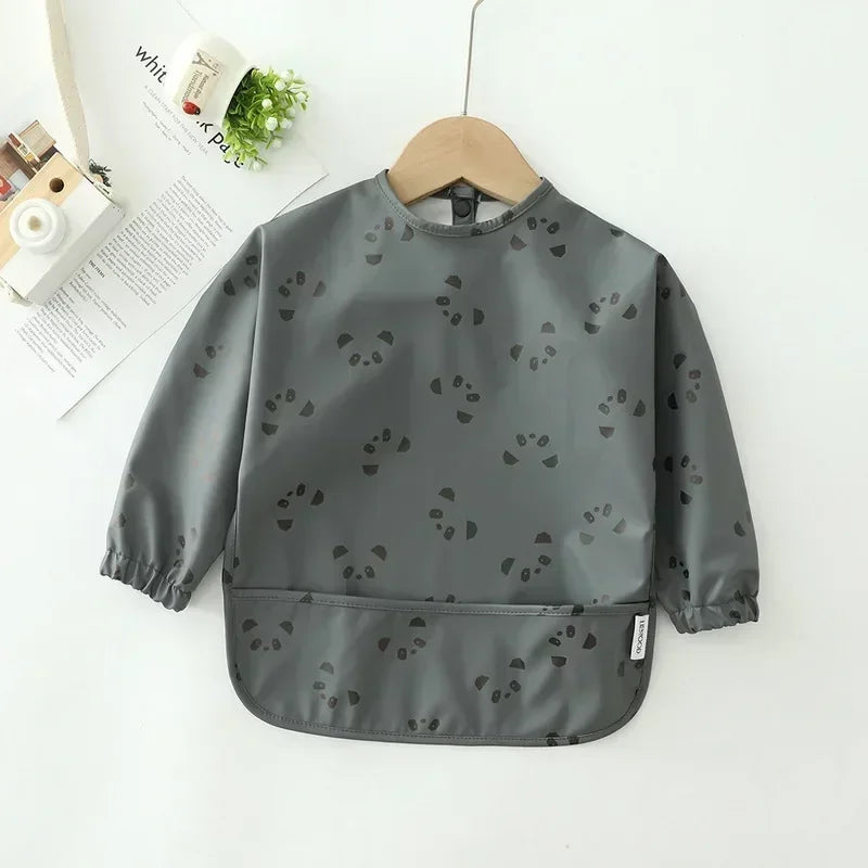 Pure Joy Messy Moments™ – Waterproof Baby Bib with Sleeves